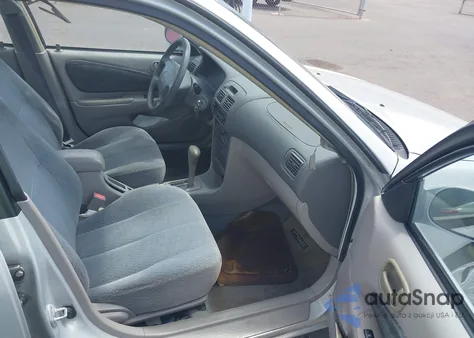 2001 Toyota Corolla Le z USA, uszkodzony, nr VIN 1NXBR12E61Z455065